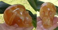 Orangencalcit Kristallschädel 260 g